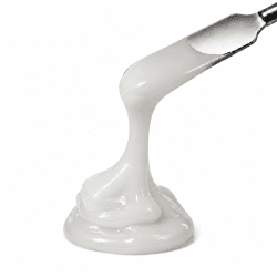 Toffee Builder Gel Creamy Cloud – creamy white builder gel on a spatula