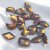 Ge dina naglar en sofistikerad touch med Frosted Peach Nail Charms! 20-pack med olikformade, frostade stenar i rosa och peachy n