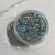Glit-Mix Holo Silver Storm is a silver glitter with a holographic effect in mixed sizes. 5g jar. Used in sticky gel, capsules