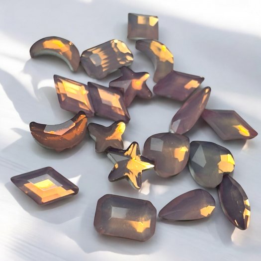 Give your nails a sophisticated touch with Frosted Peach Nail Charms! 20-pack of assorted frosted stones in pink and peachy n