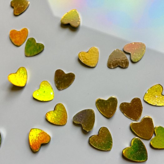 Glitter Heart Gold – Thin, gold shimmering hearts to add an elegant and playful touch to nail designs.