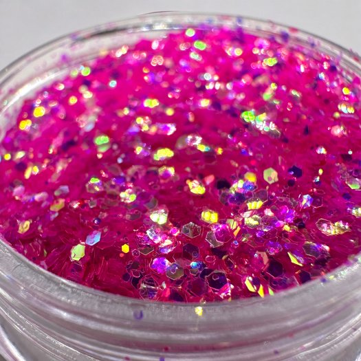 Glit-Mix Fuchsia Flame är ett cerise-rosa glitter i mixade storlekar. 5g burk. Borsta in, kapsla in eller strö ovanpå Top Gel fö