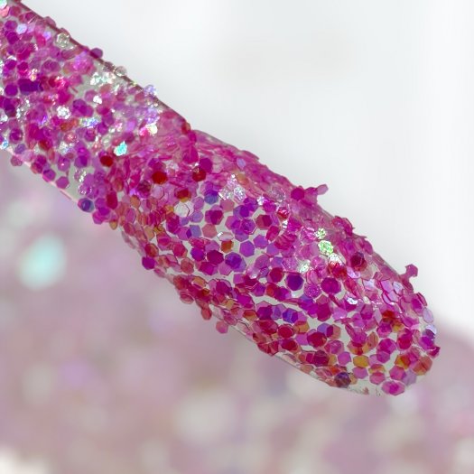 Upptäck Glitter Rainbow 1mm Rose – ett rosa glitter med fin glans och perfekt kornstorlek. Passar utmärkt för nageldesign, dekor