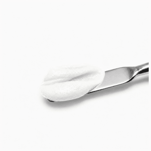 Acrygel White white acrygel on a spatula