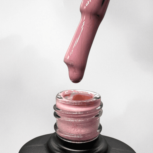 An antique, muted pink gel polish that gives the nails a sophisticated and feminine touch. Perfect for creating an elegant and t