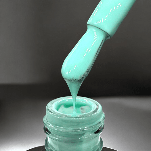 Celeste is a minty turquoise gel polish with a fresh, bright tone that enhances the nails. The color often appears slightly more