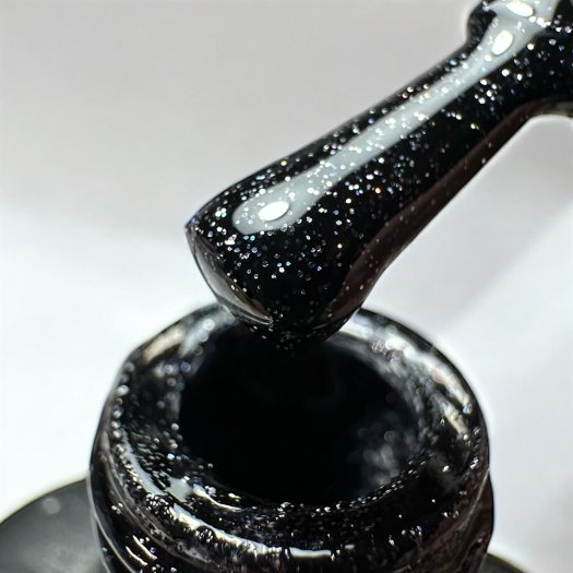 Diamond Knight Nail Systems Gel Polish. Elegant, high-gloss finish with holographic glitter.