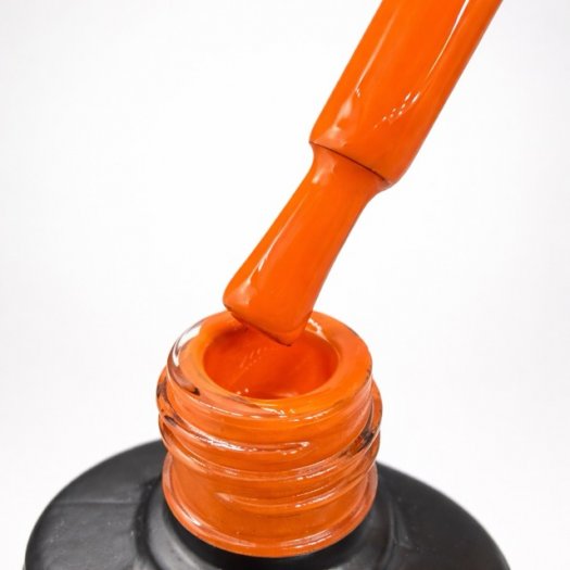 Magma Gel Polish from Nail Systems in a vivid orange shade bursting with energy, inspired by molten lava.