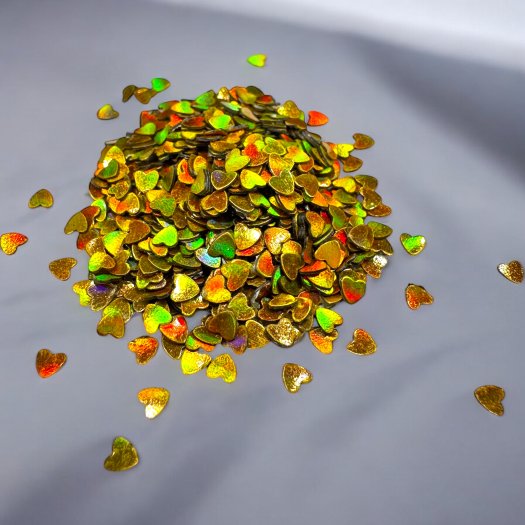 Glitter Heart Gold – Thin, gold shimmering hearts to add an elegant and playful touch to nail designs.