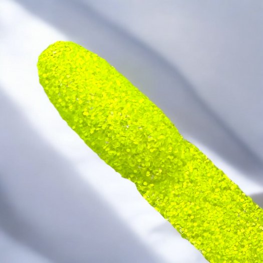 Upptäck Fluorescent Yellow 0,4mm – ett neongult glitter som lyser i UV-ljus! Perfekt för nageldesigner och kreativa projekt med