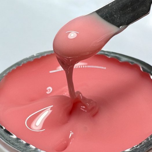Discover Toffee Builder Gel Pink Ripple – a deep pink sculpting gel with incredible self-leveling and opaque finish. Easy to sha