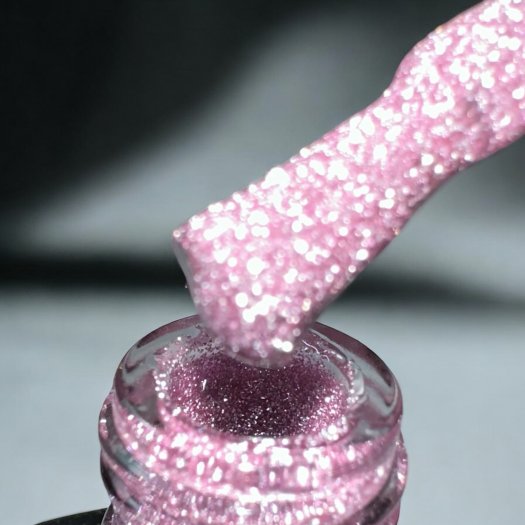 Discover Reflecting Pink Gel Polish – a reflective pink gel polish that gives the nails a magical and luxurious feel.