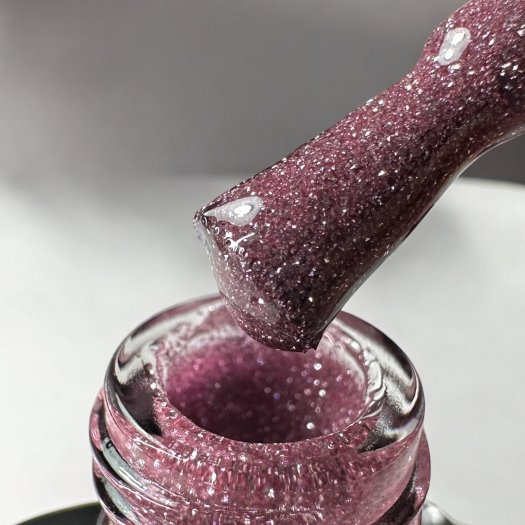 Discover Reflecting Pink Gel Polish – a reflective pink gel polish that gives the nails a magical and luxurious feel.