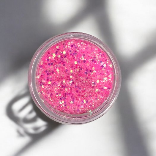 Glit-Mix Pink Pop is a bright baby pink glitter in mixed sizes. 5g jar. Use in sticky jelly, encapsulating or creating socks