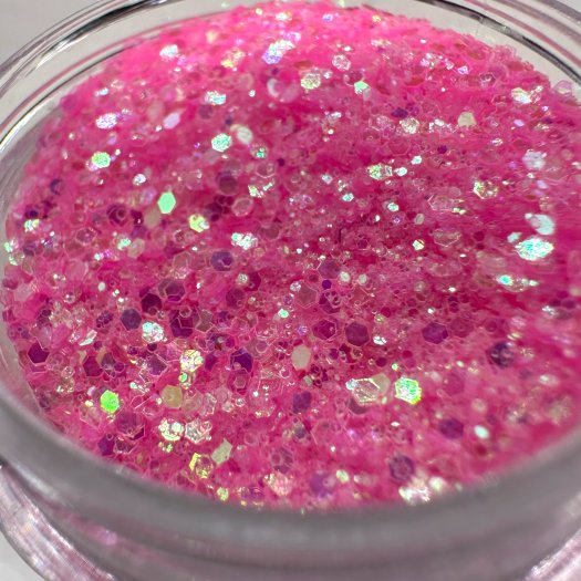 Glit-Mix Pink Pop is a bright baby pink glitter in mixed sizes. 5g jar. Use in sticky jelly, encapsulating or creating socks