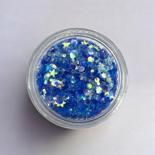 Glit-Mix Sky Twinkle contains transparent blue sequins in both round and star shapes. 5g jar. For encapsulation in design only –