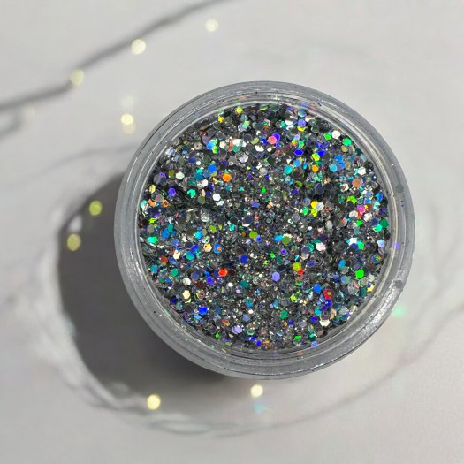 Glit-Mix Holo Silver Storm is a silver glitter with a holographic effect in mixed sizes. 5g jar. Used in sticky gel, capsules