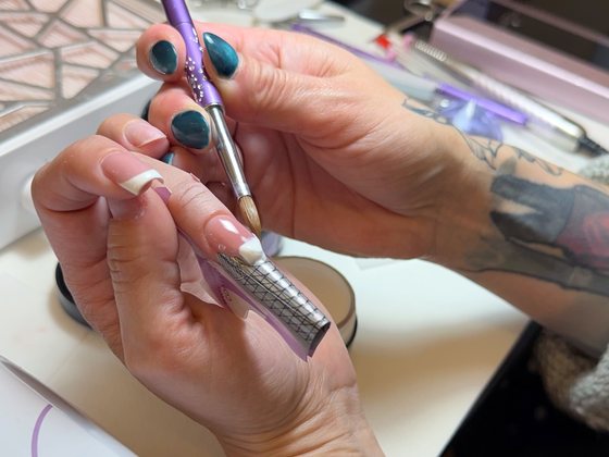 An extension built on a form during the nail technician training